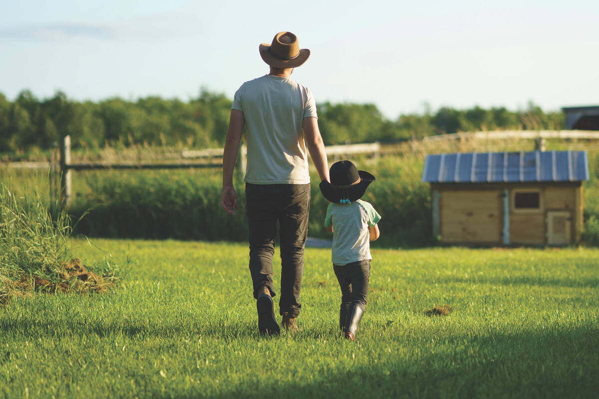 Father and child walk across a vibrant green field on a sunny day, evoking feelings of connection, nature, and simplicity, surrounded by rural scenery perfect for family-themed concepts and peaceful environments.