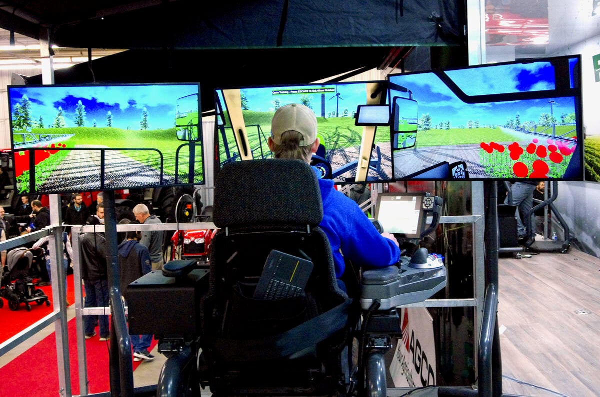 A simulator set up at the Fendt booth at Manitoba Ag Days 2025 gives attendees a taste of what it&rsquo;s like to drive one of the machinery manufacturer&rsquo;s pieces of farm equipment. Photo: Alexis Stockford