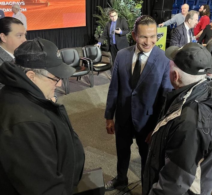 Manitoba Premier Wab Kinew speaks to farm show attendees after his Manitoba Ag Days address on Jan. 21, 2025, in Brandon. Photo: Alexis Stockford