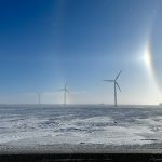 Windmills on a field during a cold winter day in central Manitoba. Photo: Alexis Stockford