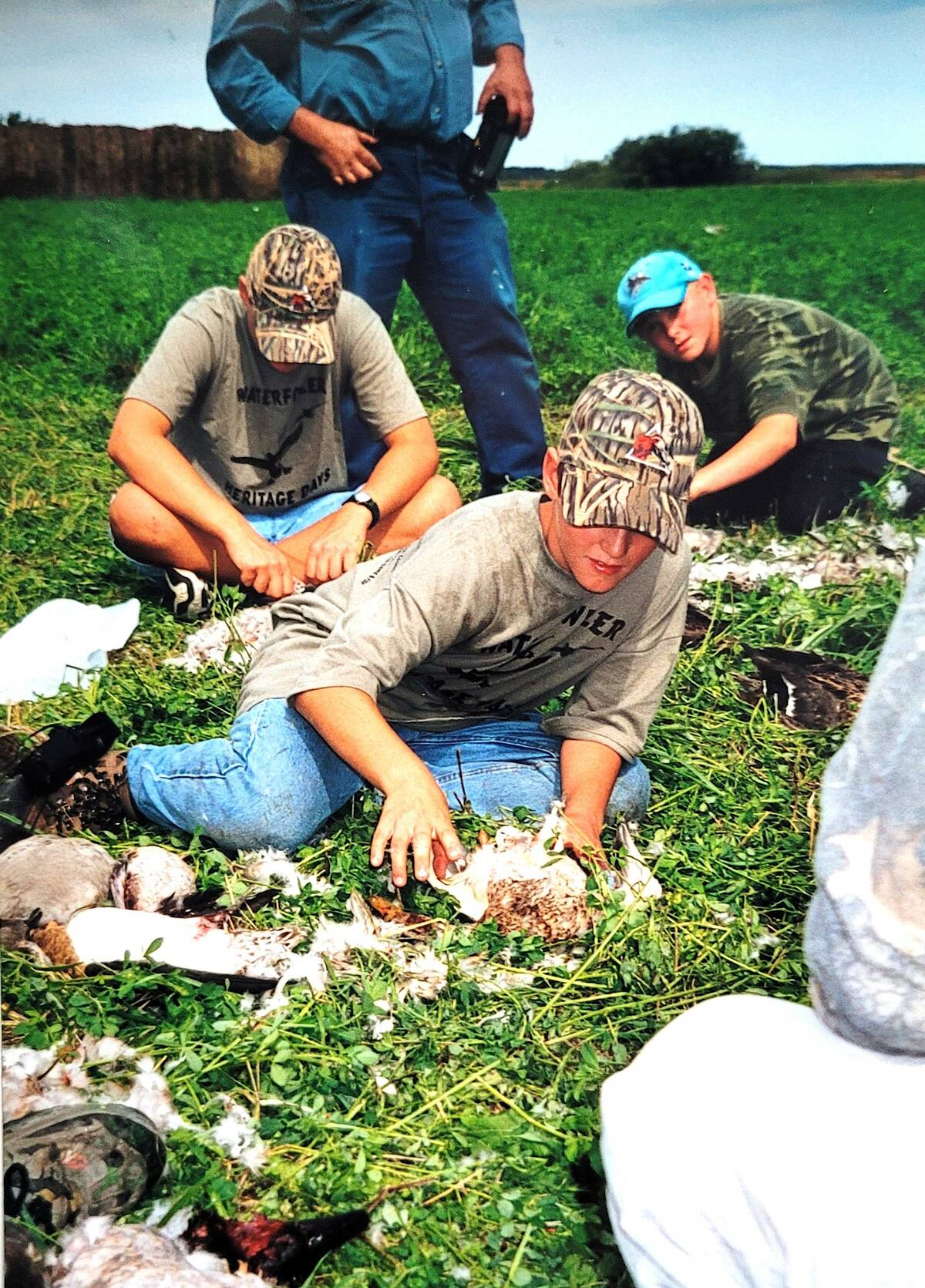 Mentored hunts include hands-on lessons on cleaning and properly taking game home. Photo: Tim Sopuck