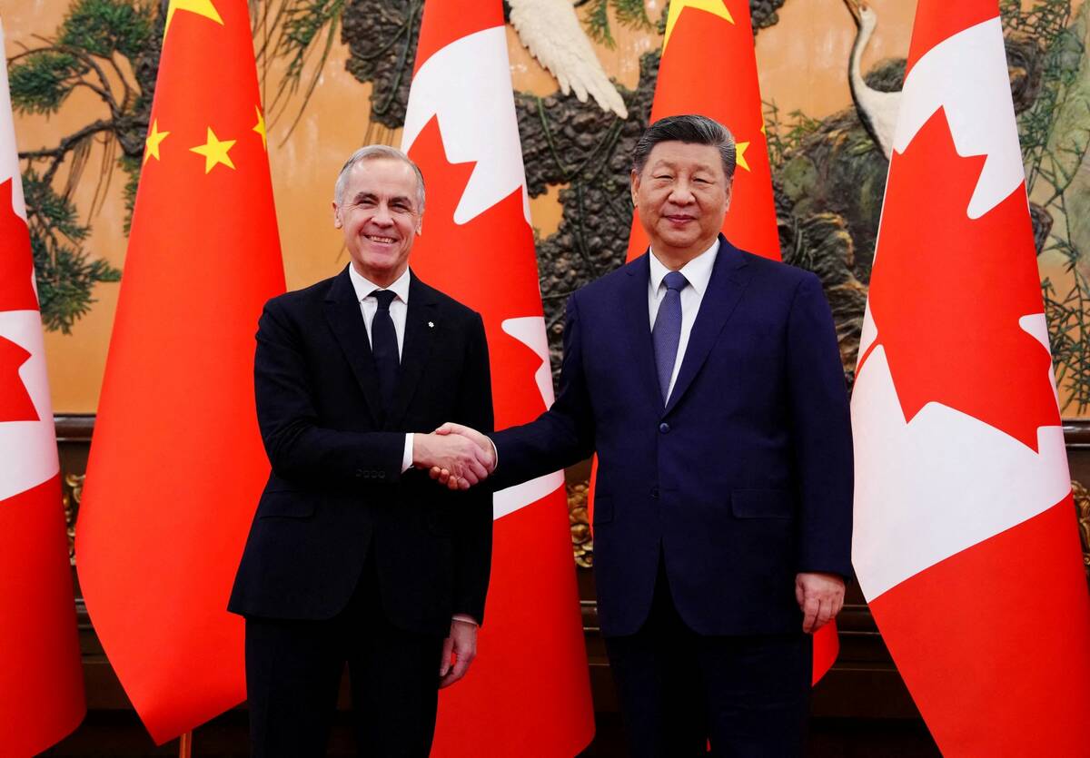 Canadian Prime Minister Mark Carney shakes hands with President of China Xi Jinping at the Great Hall of the People in Beijing, China, on Jan. 16, 2026. Sean Kilpatrick/Pool via Reuters