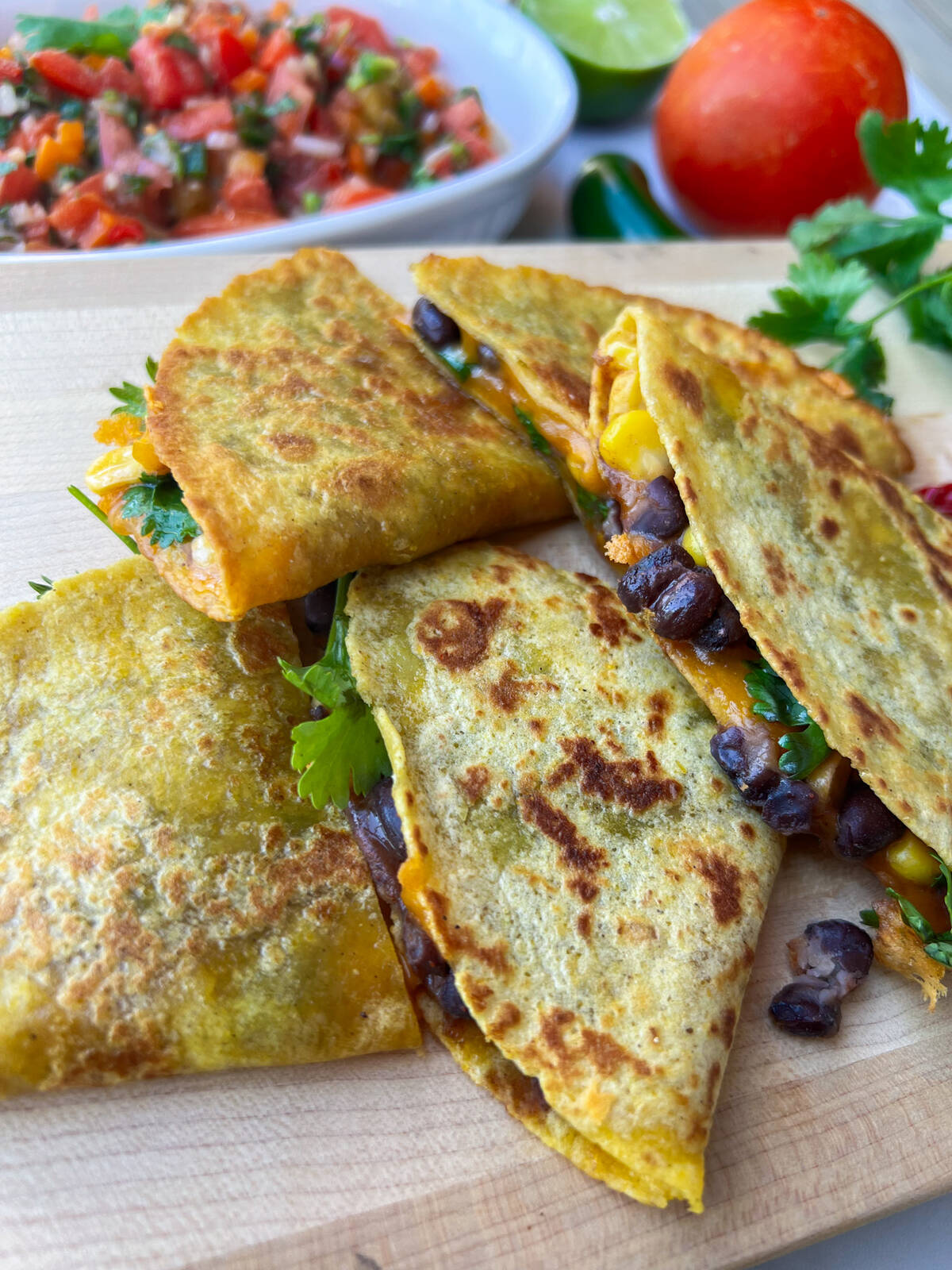 Replace the black beans and corn in these quesadillas with any leftover meat and veggies.
Photo: Getty Stewart