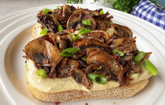 Leftover hummus and a handful of mushrooms make the most delicious toast.