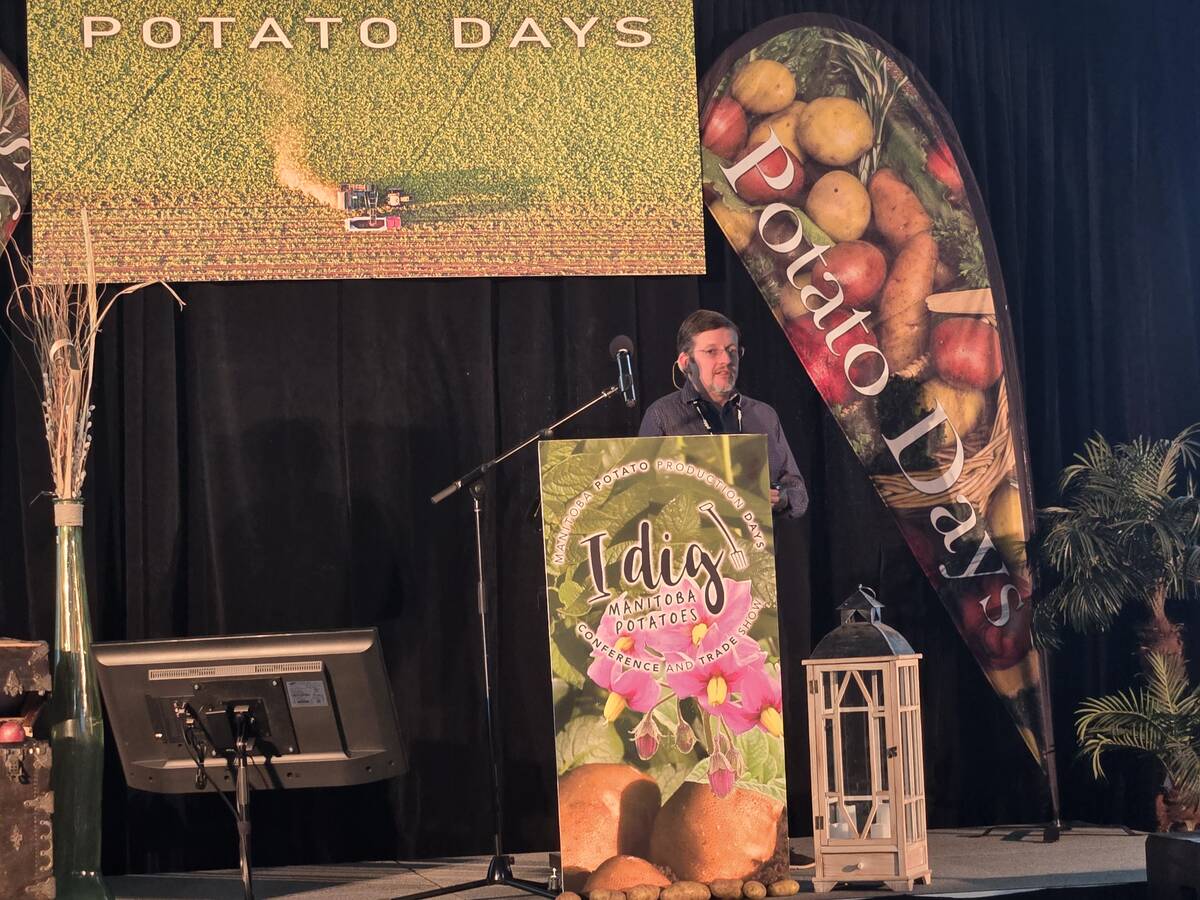 Tyler MacKenzie, research and development co-ordinator at the Agricultural Certification Services Lab of Potatoes New Brunswick, speaks to attendees at Manitoba Potato Production Days, held at the Keystone Centre in Brandon from Jan. 27-29, 2026. Photo: Miranda Leybourne