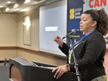 MCGA executive director Delaney Ross Burtnack addresses members during the group&rsquo;s annual meeting, where financial projections and a possible levy increase were discussed. Photo: Don Norman