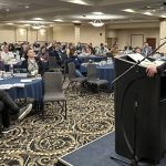 Canola Council of Canada president and chief executive officer Chris Davison speaks at the Manitoba Canola Growers Association annual meeting. Davison said reopening the Chinese market was the industry’s top priority. Photo: Don Norman