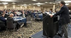 Canola Council of Canada president and chief executive officer Chris Davison speaks at the Manitoba Canola Growers Association annual meeting. Davison said reopening the Chinese market was the industry&rsquo;s top priority. Photo: Don Norman
