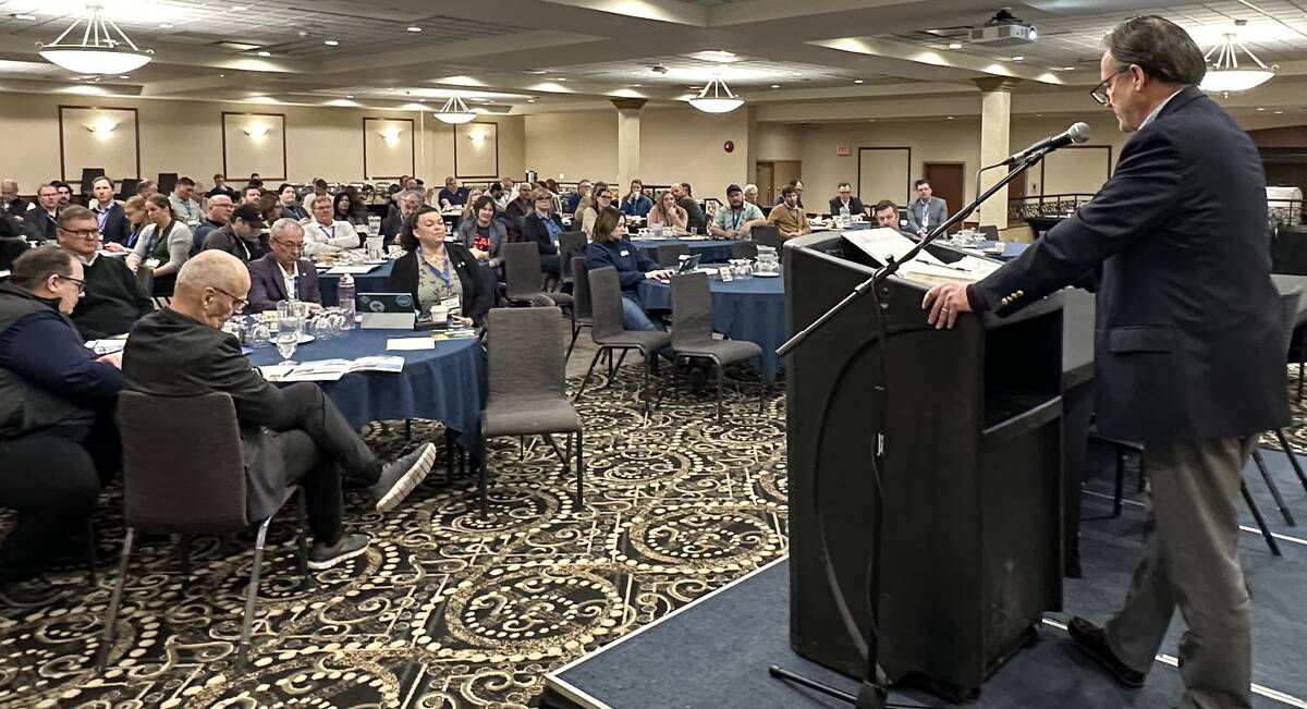 Canola Council of Canada president and chief executive officer Chris Davison speaks at the Manitoba Canola Growers Association annual meeting. Davison said reopening the Chinese market was the industry’s top priority. Photo: Don Norman