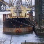 A grain ship sits awaiting its cargo at an idle grain terminal in the port of Vancouver March 16 after government grain weighers struck grain terminals, closing four of Vancouver's five grain terminals in a push for a new contract for federal trade employees. The bulk of Canada's winter wheat exports move through the port of Vancouver.

MB/ELD/ME