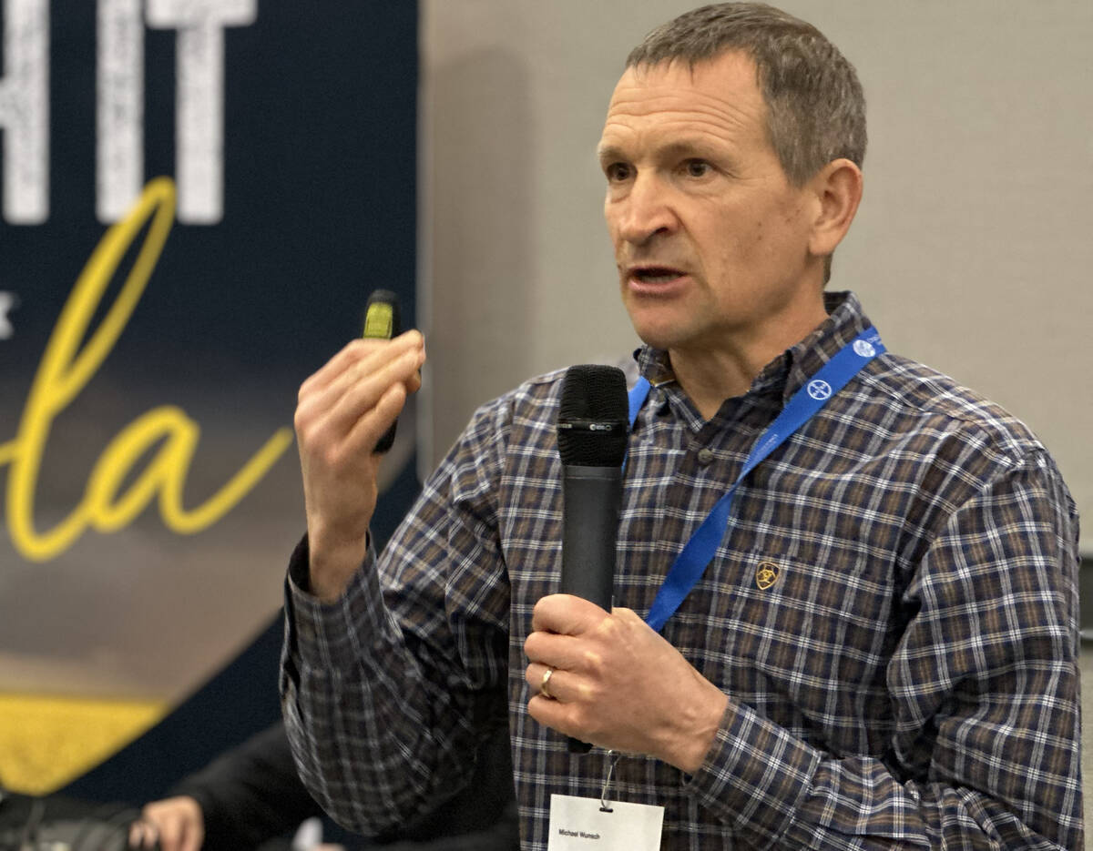 Michael Wunsch, a plant pathologist with North Dakota State University, speaks at CropConnect 2026 in Winnipeg. Wunsch emphasized that fungicides protect only the canopy present at application, making timing critical for white mould control. Photo: Don Norman