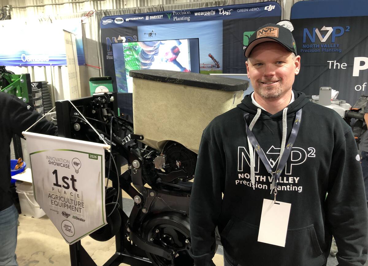 Andrew Kippen, managing director with North Valley Precision Planting, with the company’s Innovation Award-winning CornerStone row unit at Manitoba Ag Days in January.  Photo: Greg Berg