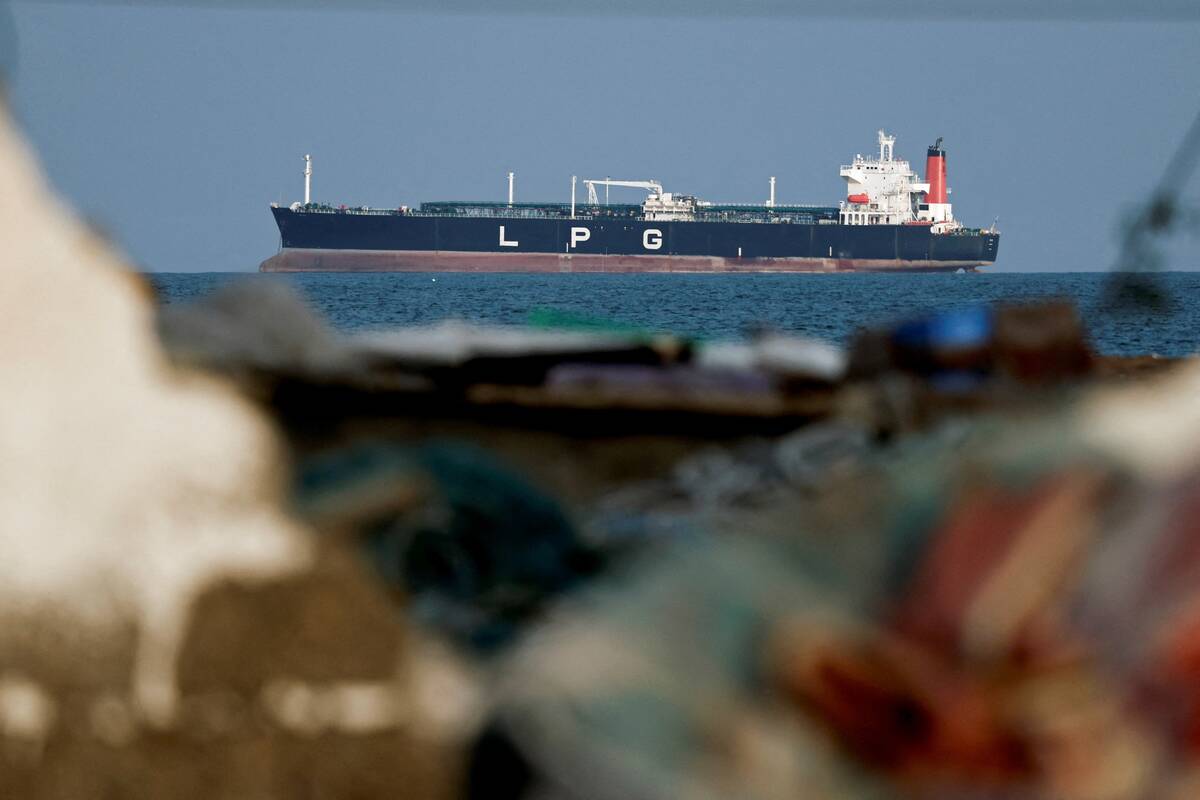An LPG gas tanker at anchor as traffic is down in the Strait of Hormuz, amid the U.S.-Israeli conflict with Iran, in Shinas, Oman, March 11, 2026. Photo: REUTERS/Benoit Tessier
USABLE UNTIL APRIL 8, 2026