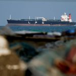 An LNG tanker sits at anchor off the coast of Shinas, Oman. The near closure of the Strait of Hormuz has disrupted global energy and fertilizer supplies as the U.S.-Israel war with Iran enters its third week. Photo: Reuters
