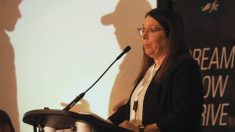 KAP president Jill Verwey speaks at a podium during a Keystone Agricultural Producers event, addressing Manitoba input costs and rural concerns. Photo: Don Norman