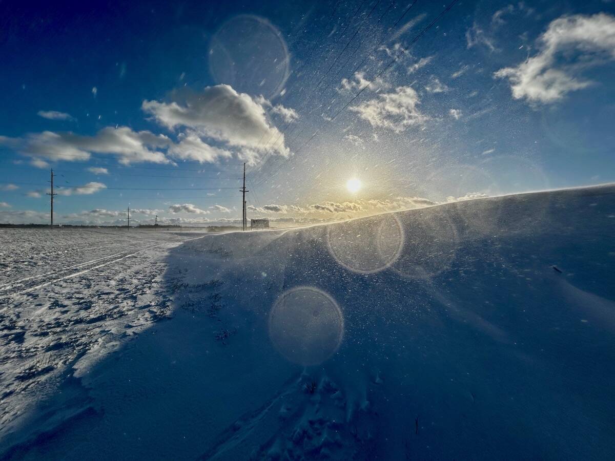 Light reflects of crystals of blowing snow during a blustery winter day near Russell, Man., December 2023.