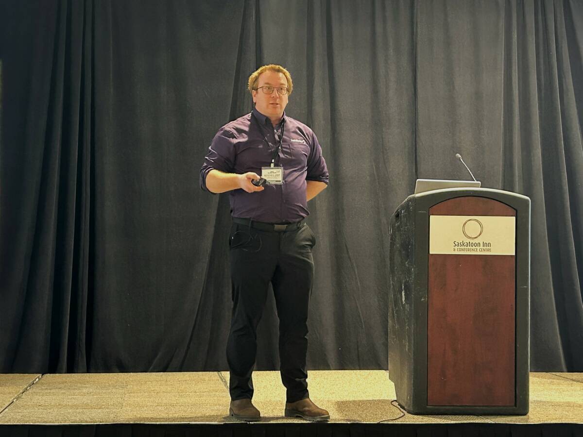 SaskBarley research manager Mitchell Japp presents plant growth regulator research findings at the Top Crop Summit in Saskatoon. Photo: Janelle Rudolph.