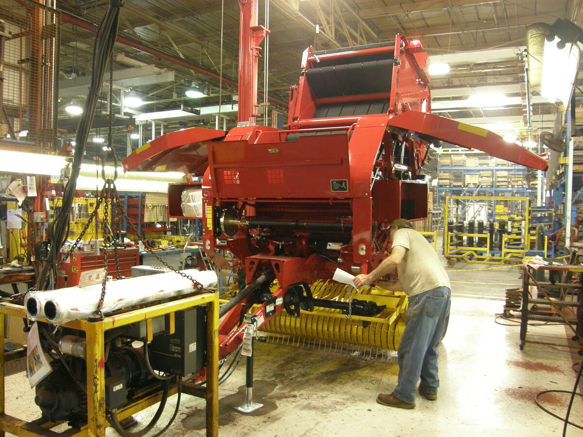 Red farm machinery being assembled on the AGCO factory floor. Photo: Agco/Fendt.