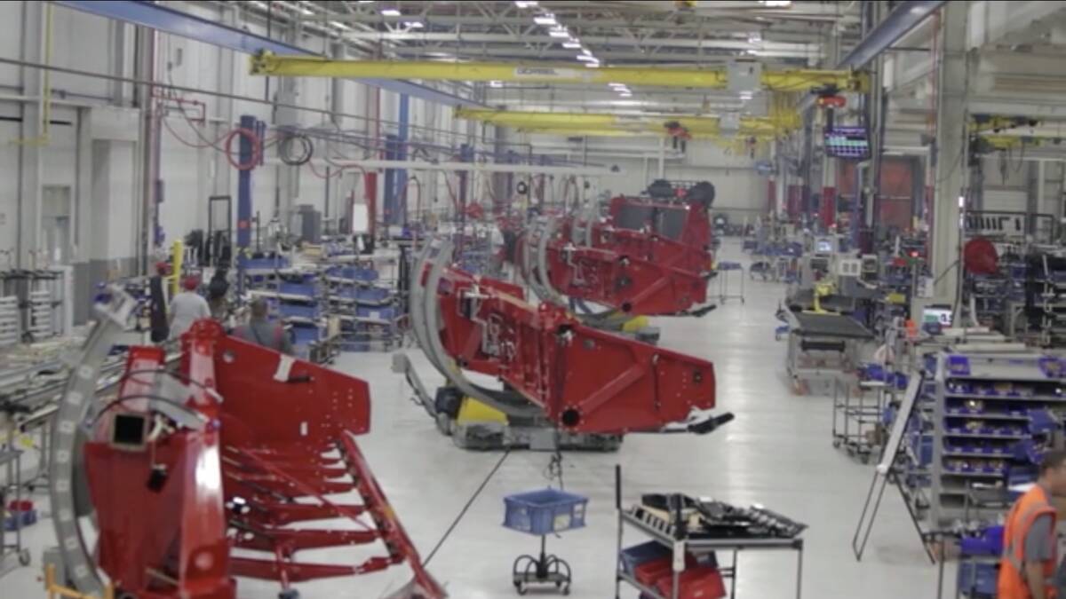 Red combine components on the CNH Industrial manufacturing floor. Photo: Scott Garvey.
