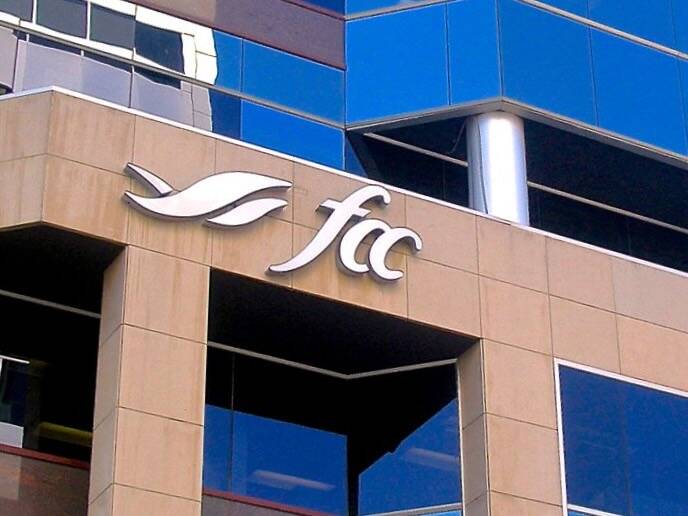 The Farm Credit Canada logo and signage on the exterior of a modern office building. FCC's Let's Grow Canada website is one of several industry initiatives working to strengthen Canadian agriculture's collective voice. Photo: Dave Bedard.